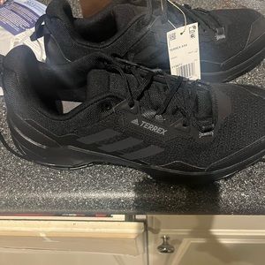 Brand new Adidas Terrex sneakers.Waited too long to return so selling on here.